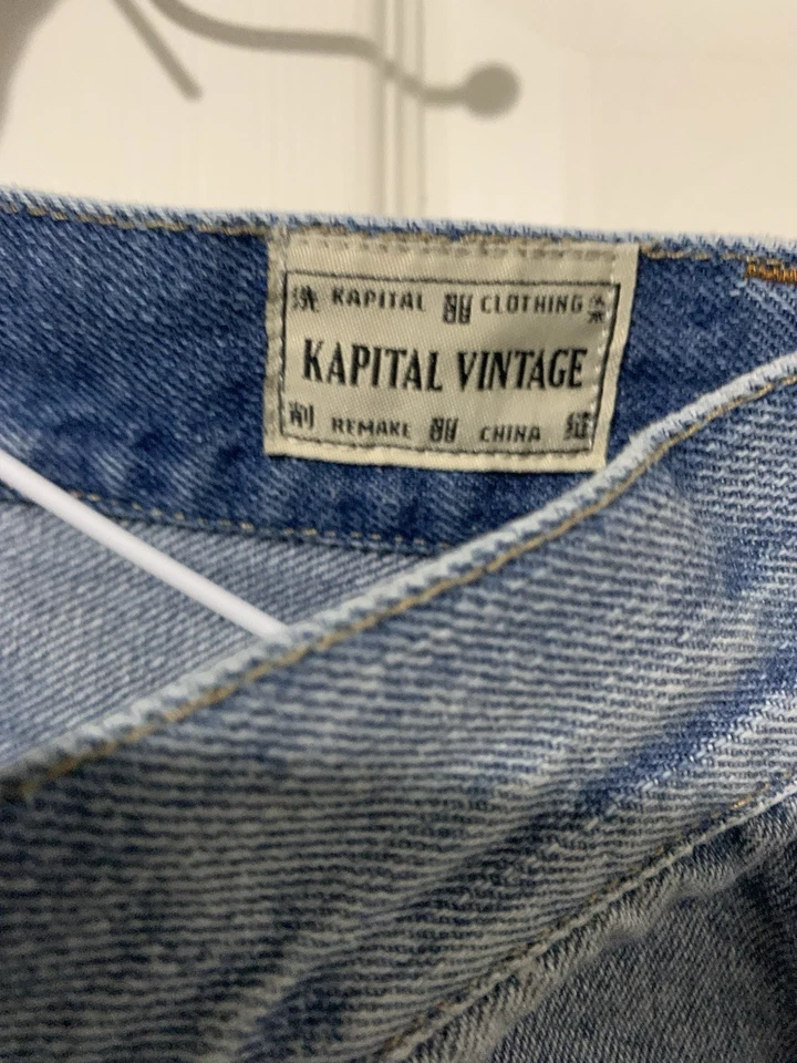 Pantalones de mezclilla vintage con parche facial sonriente Foto 4 de 4