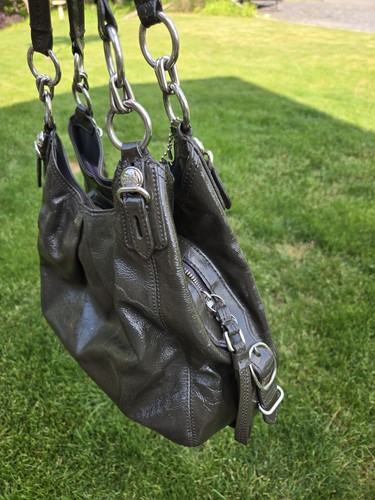 Dark Gray Leather Coach Shoulder Bag With Magnetic Closures And Silver Hardware