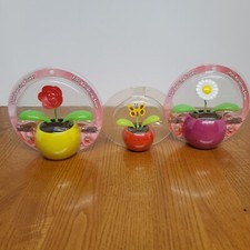 Solar Dancing Flowers And Butterfly