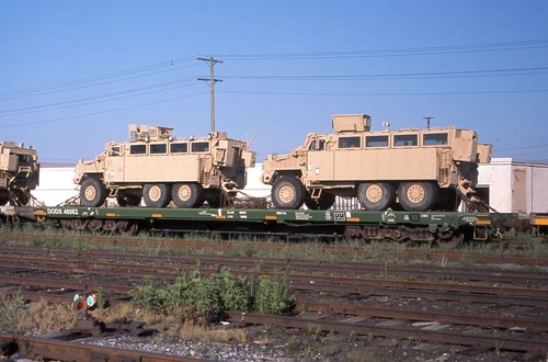 Original Slide: DODX Department of Defense 40082 89' Flat With Military Load - Picture 1 of 1
