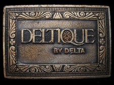 LB15105 VINTAGE 1970s DELTIQUE BY DELTA FAUCET COMPANY BELT BUCKLE