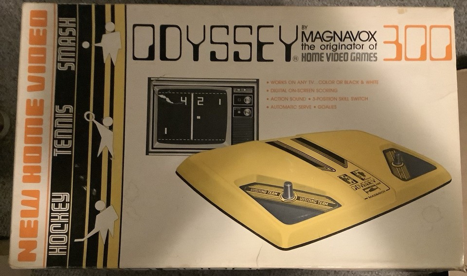 A 1976 Magnavox Odyssey 300 — one of the very first home video game consoles ever made, still in its original box; this is a genuine piece of gaming history.