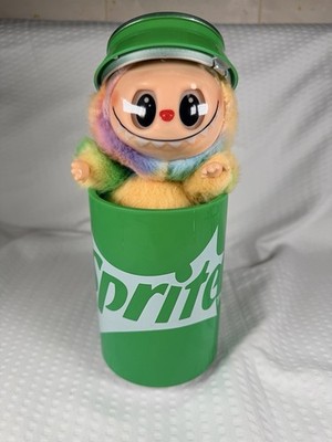 Sprite Can With Elfish Creature Inside.