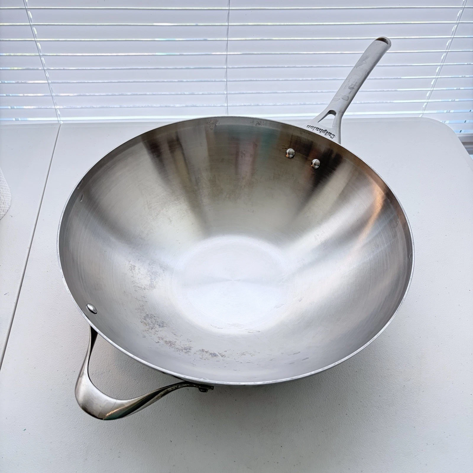 Calphalon Stainless Steel 13" wok #155. 4" high bowl with 9" handle
Opens in a new window or tab