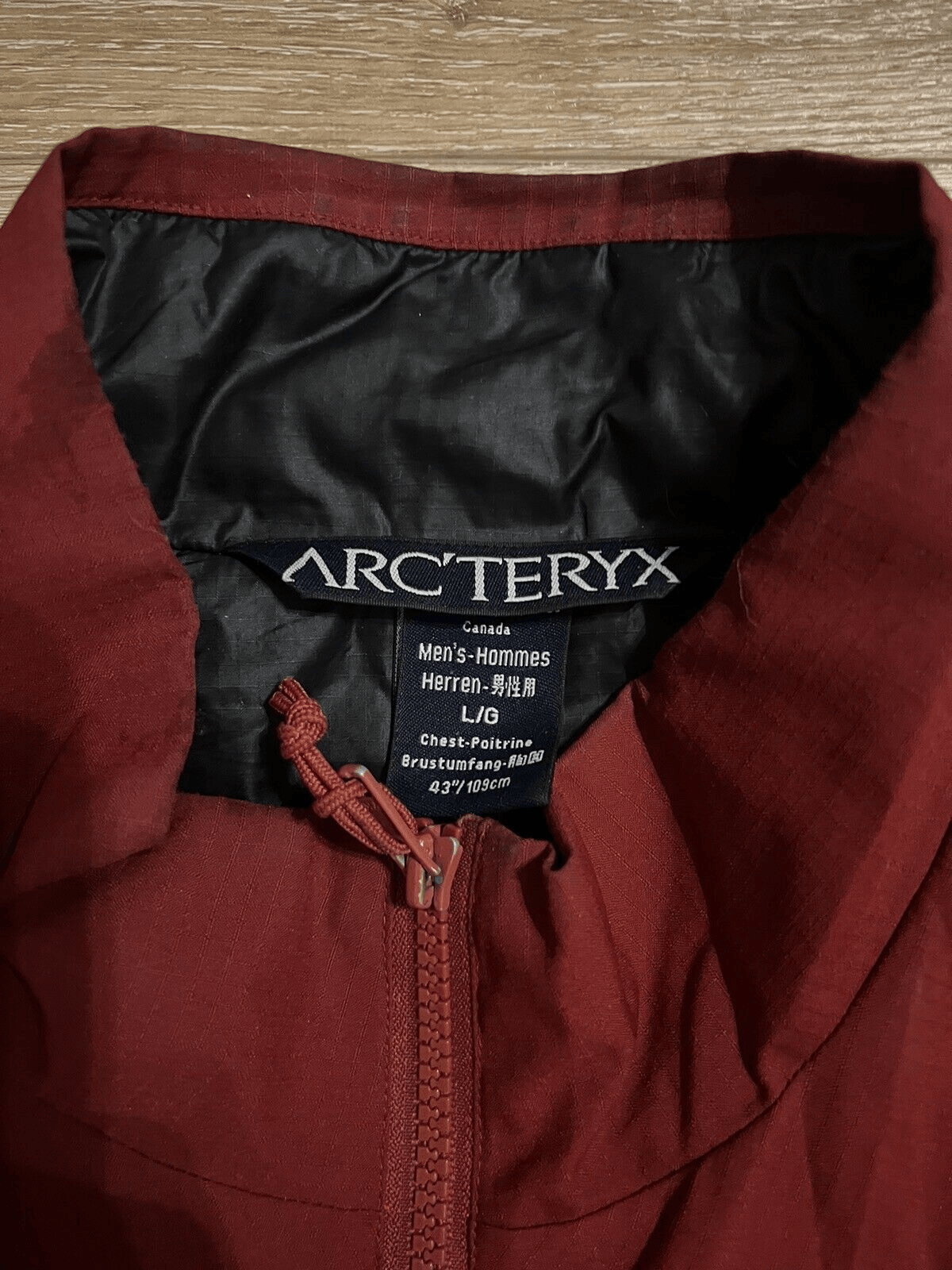 ARC'TERYX Giacca morbida Primaloft Arcteryx da uomo rossa cerniera intera taglia large