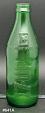 7up; 10oz. No Deposit-No Refill embossed soda pop bottle