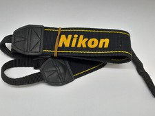 VINTAGE NIKON WIDE CLEAN BLACK STRAP WITH YELLOW LOGO MEASURES APPROX 97CM