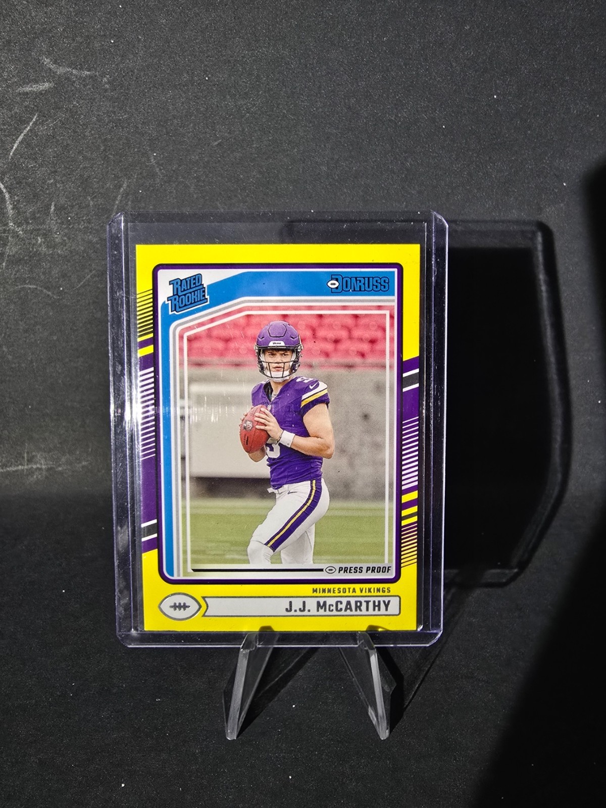 2024 Panini Donruss - Rated Rookie J.J. McCarthy #303 Press Proof Yellow (RC)