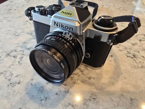 Nikon FE 35mm Film Camera – Never Used – SN: 4248073 – W/ Tokina EL 28