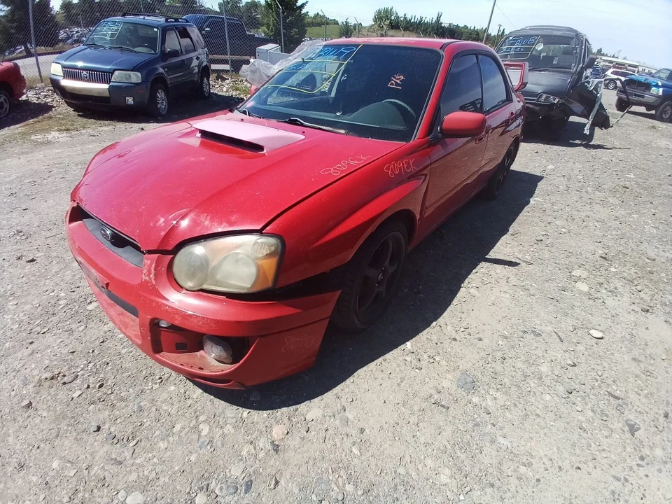 Bobina de 2004 Subaru Impreza 2,0 L 12061439 Foto 4 de 4