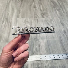 1971-1972 Toronado TRUNK EMBLEM Oldsmobile Olds Badge Nameplate Metal Ornament