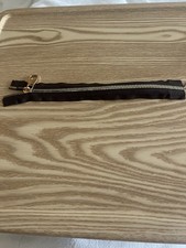 Louis Vuitton Brown Zipper Gold Tone Hardware...