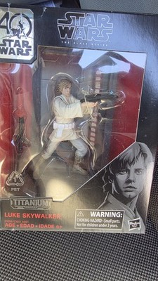 Star Wars - Titanium Series - Luke Skywalker 3.75-Inch Figure Box Scuffed