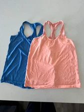 TWO Small Atheltic Fit Xersion Tank Tops - Blue and Peach