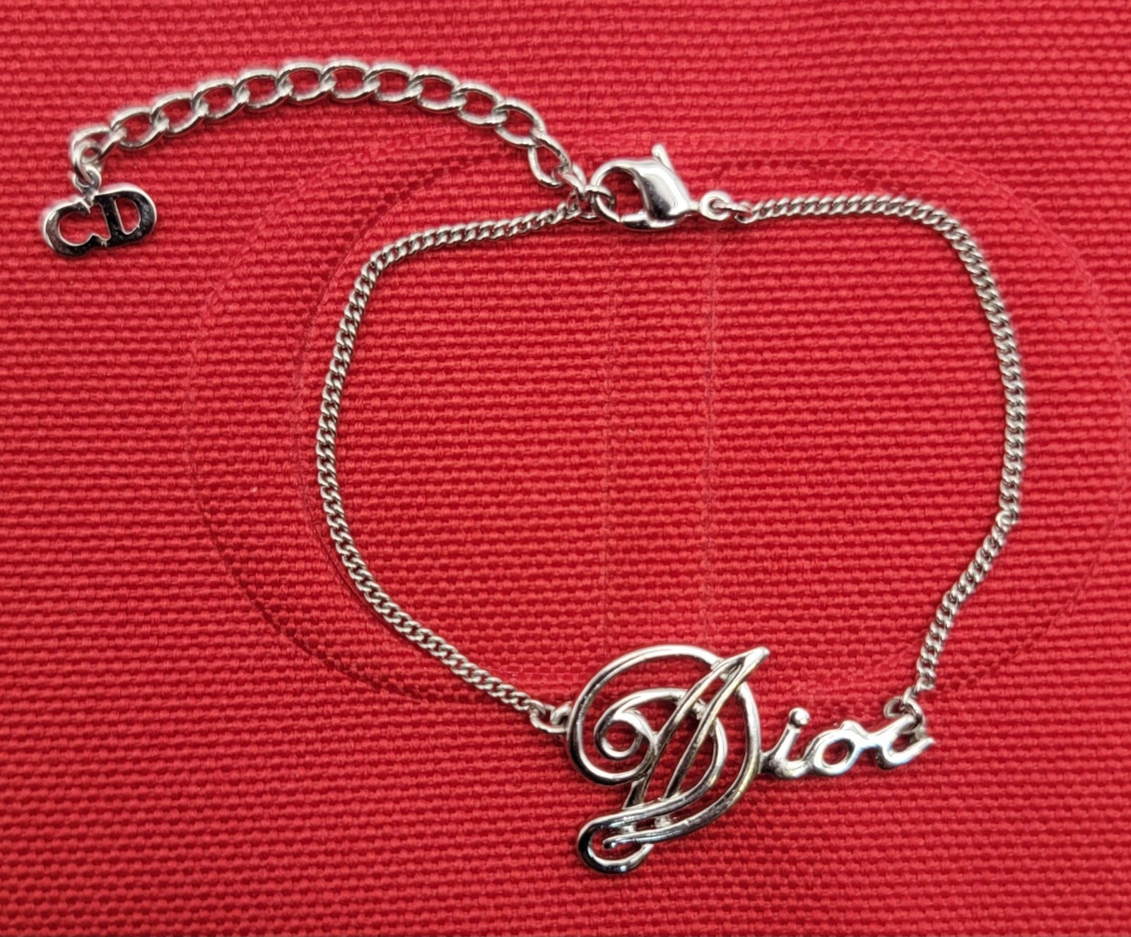 Bracelet pendentif cursif Christian Dior 6 3/4