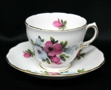 ROYAL VALE RIDGWAY POTTERIES ENGLAND FOOTED TEACUP & SAUCER PINK BLUE FLORAL