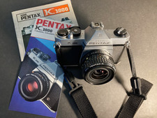 Asahi Pentax K 1000 body with 28mm SMC 2.8 Pentax lens, with strap . 488