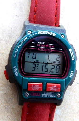 NO RSV WOMENS IRONMAN INDIGLO   RED NEW 5 YEAR BATTERY  90's 8 Lap