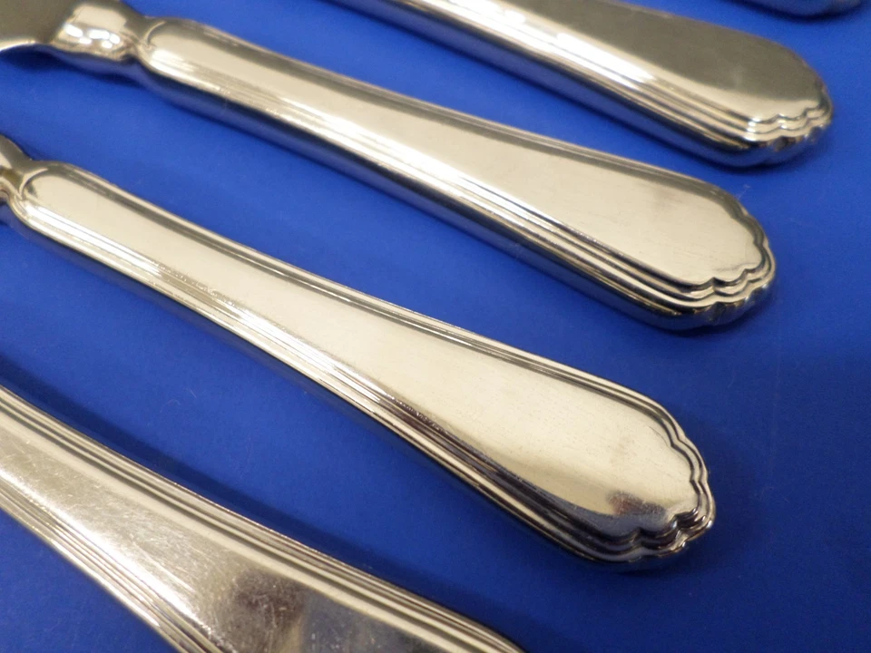 5 CUCHILLOS PARA CARNE HOLANDA 8 3/4" Zwilling JA Henckels HEN17 con borde de contorno Foto 2 de 4