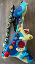 B. toys Woofer Musical Guitar Interactive Toddler Toy Blue Dog Instrument