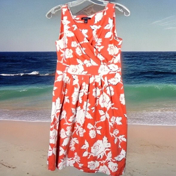 White dress hot sale with orange flowers