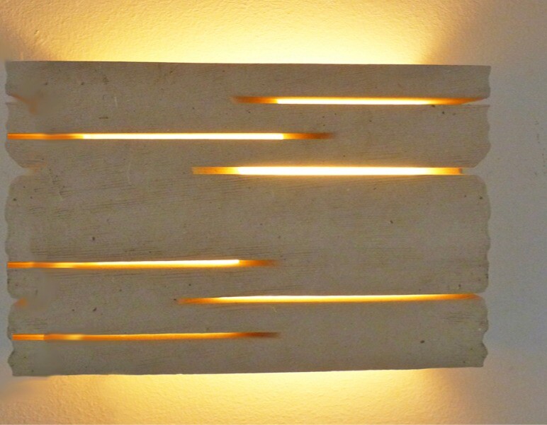 Applique taglio di luce artigianale in pietra naturale di Vicenza