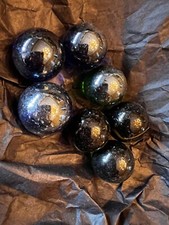 7 Vintage Black Shiny Glass Marbles Some UV Reactive