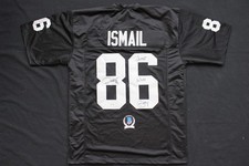 CAMISETA NEGRA FIRMADA POR ROCKET ISMAIL RAIDERS CON CERTIFICADO DE AUTENTICIDAD JUST WIN BABY BAS