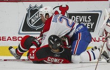 Mathieu Dandenault Montreal Canadiens lays a hit on Scott Go- Ice Hockey Photo