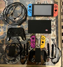 Nintendo Switch with Pro Controller, 4 Joy-cons, 120 GB Micro-SD Memory Card