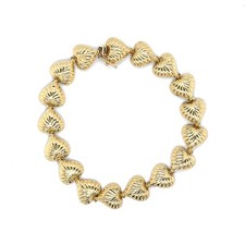 14KT YELLOW GOLD TEXTURED HEART LINK BRACELET 7.75", 7.3 GRAMS