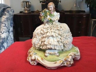 Capodimonte porcelain, Lady on Chair Holding Flowers. Lace dress in porcelain
