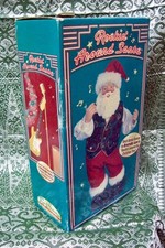 1999 "ROCKIN AROUND THE CHRISTMAS TREE" BRENDA LEE SINGS  SANTA DANCES-BOXED