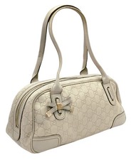 A White Gucci GG Guccissima Leather Boston Bag.  With dust bag, great condition