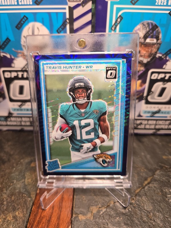 2025 Panini Donruss Optic - Rated Rookie Travis Hunter #201 Purple Scope Prizm