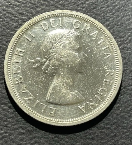 Canada 1953 Dollar Flat B Silver Coin : ASW  0.600 oz-BSTK0124