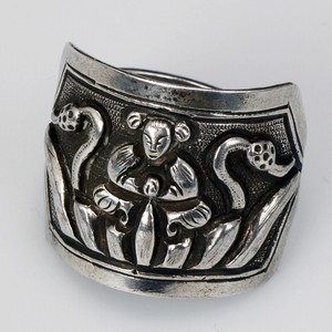 Antique Chinese Silver Ring with Repousse Immortal Design Late 19th Century