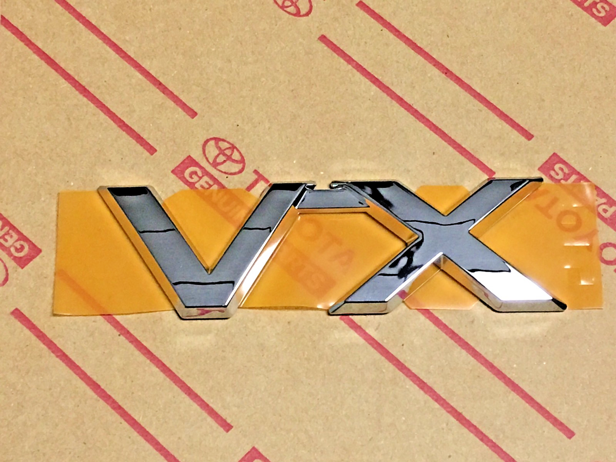 Grayページ 200 Series Toyota Land Cruiser VX Badge | 60120 | Genuine OEM