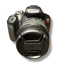 Canon EOS Rebel T7 Digital 24.1MP SLR Camera with 18-55mm Lens w/Battery Adapter