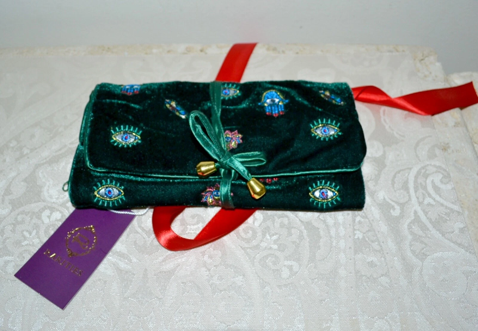NWT $95 RARITIES Carol Brodie Velvet Jewelry Roll Green Evil Eye