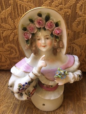 4 1/2''  German Porcelain half Doll w/flowers in hat & hold a Bouquest of flowers