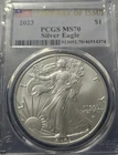 A 2023 $1 American Silver Eagle PCGS MS70 FDOI Flag Label. APMEX PKG