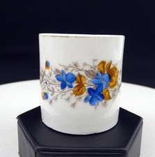 GERMAN ANTIQUE PORCELAIN BLUE  BROWN FLORAL VINE 2 1/2" CHILDS MUG 1890 - 1920