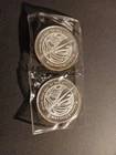 Lot of 2 Trident Silver 1 Troy Ounce, Fine Silver Round. 2 Ounces Total.