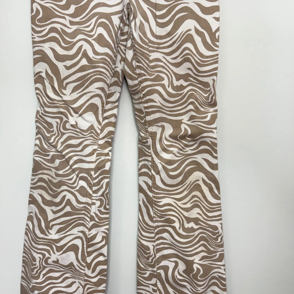 Pantalones acampanados de tiro alto Abercrombie para niños talla 13/14 beige blanco estampado de remolino Foto 2 de 4