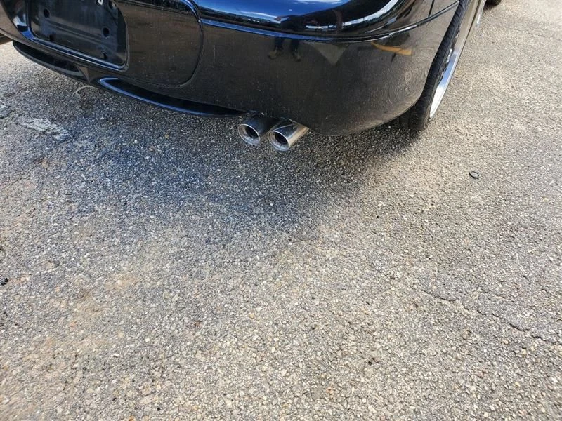 Parachoques trasero negro tiene arañazos OEM 1999 Mitsubishi 3000GT Foto 2 de 4