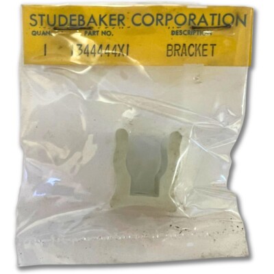 N.O.S. White Sunvisor Clip | 1962-66 Studebaker Hawk & Lark | 1344444X1