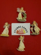 Set Of 4 Rite Aid Home Fairy  Statues Figurine  Collectibles