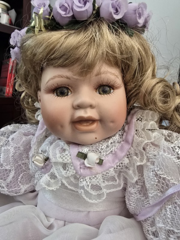 Sitting Porcelain Doll 16 In