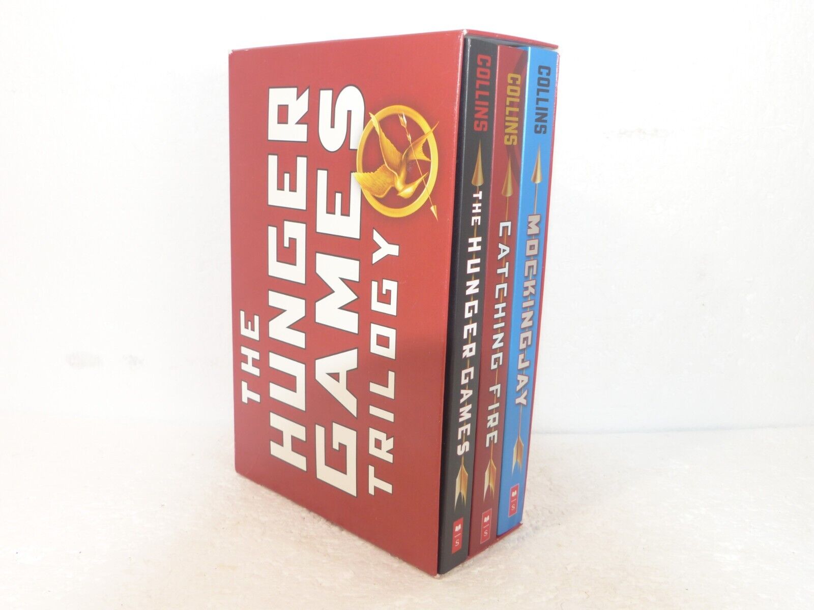 Hunger Games Trilogy: Hunger Games / Catching Fire / Mockingjay Scholastic  Press